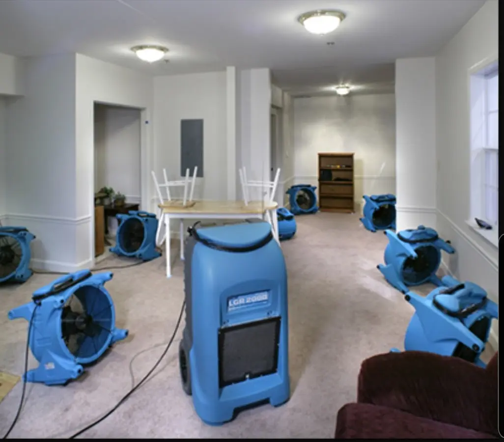 Air movers and dehumidifier setup for Water Damage Restoration in Springdale